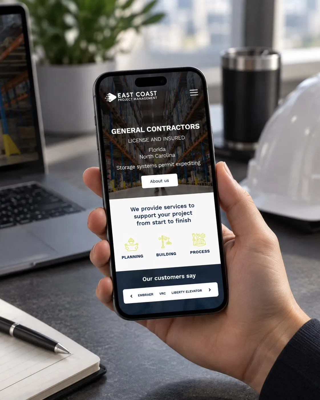 East Coast Project Management website on a phone